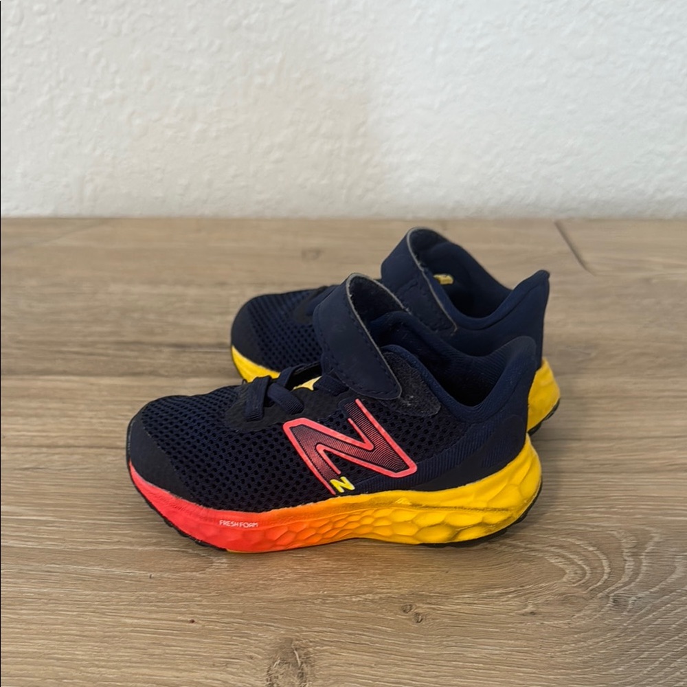 New Balance Kids' Navy Sneakers with Yellow and Red Accents SIZE 5